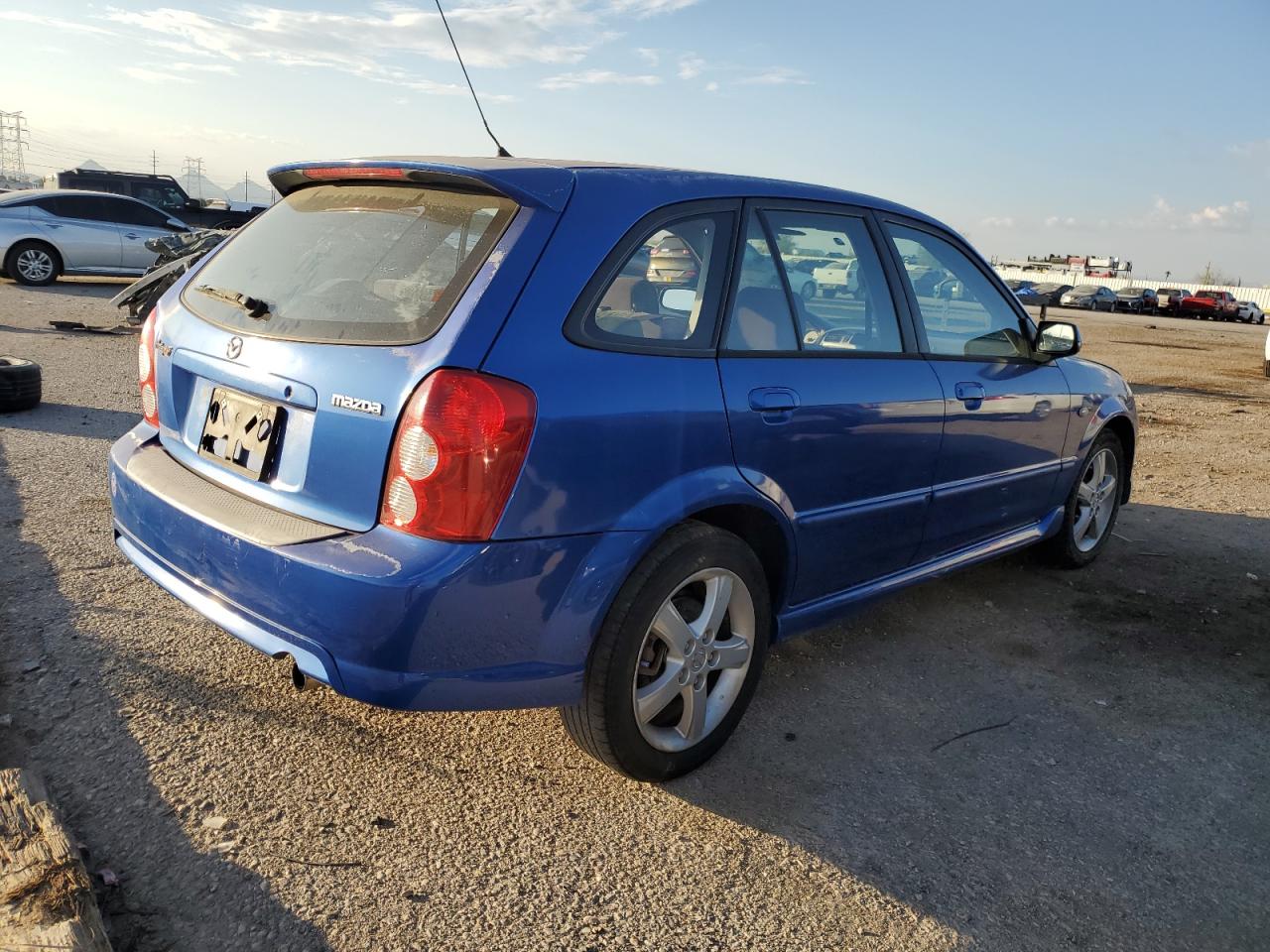 MAZDA PROTEGE 2003 — 4