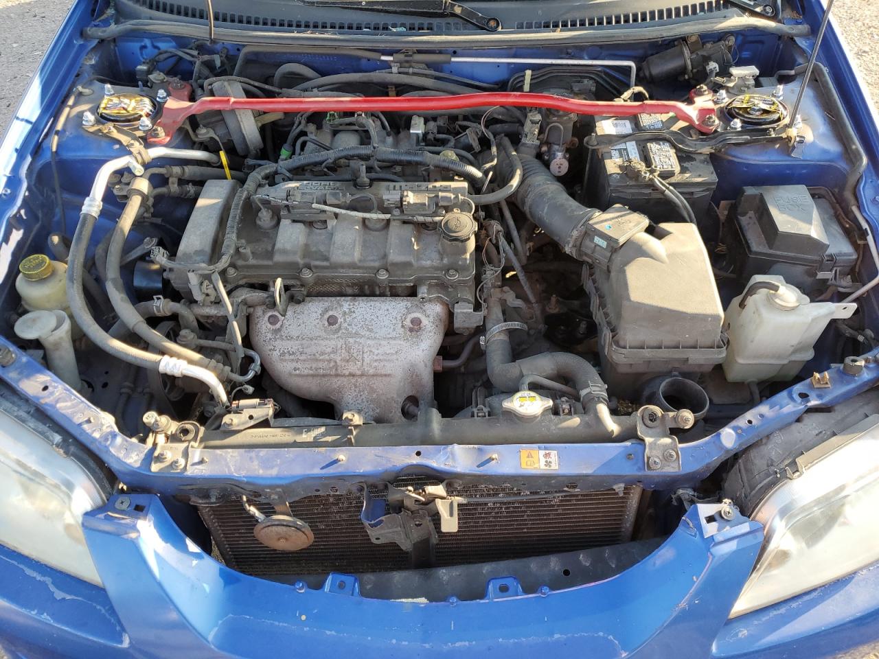 MAZDA PROTEGE 2003 — 12