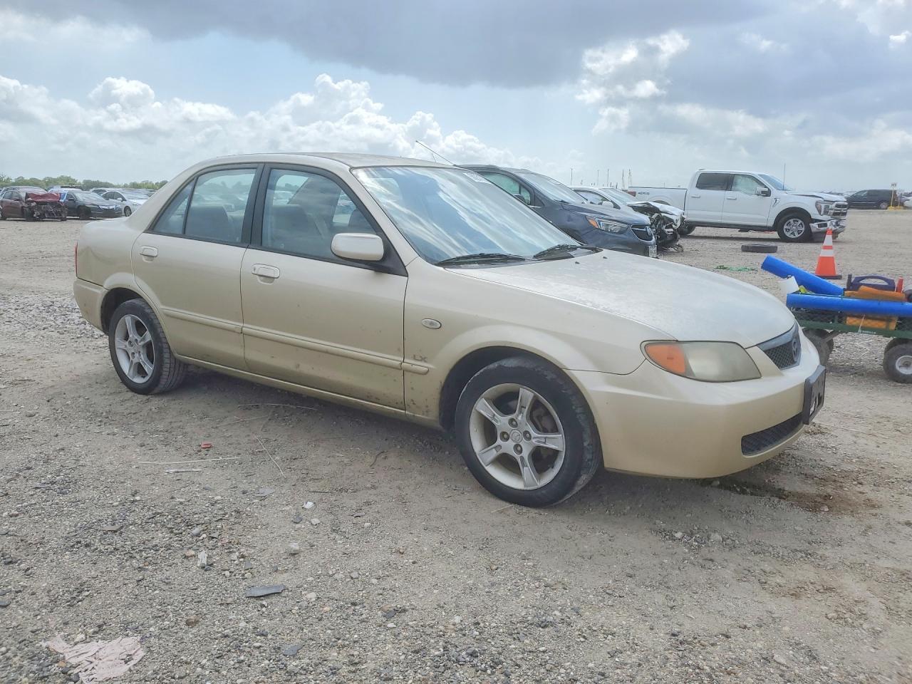 MAZDA PROTEGE 2003 — 5