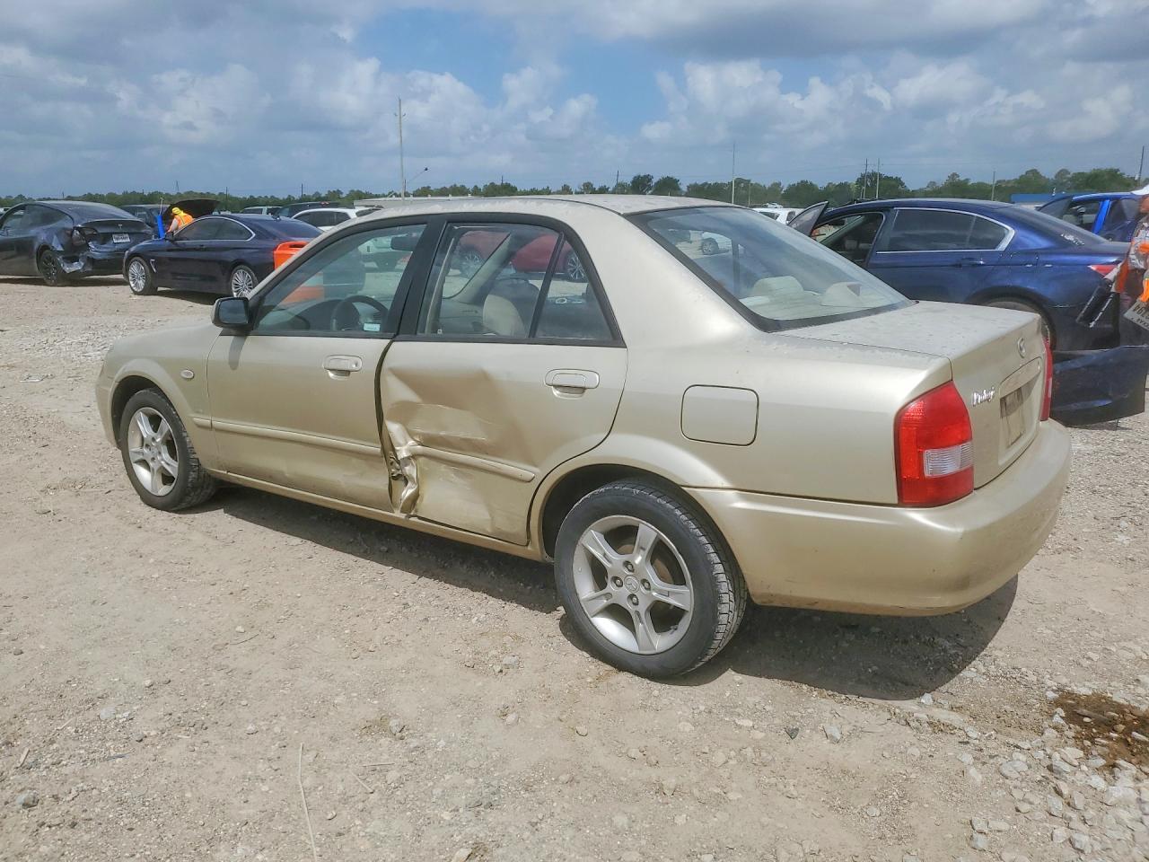 MAZDA PROTEGE 2003 — 3