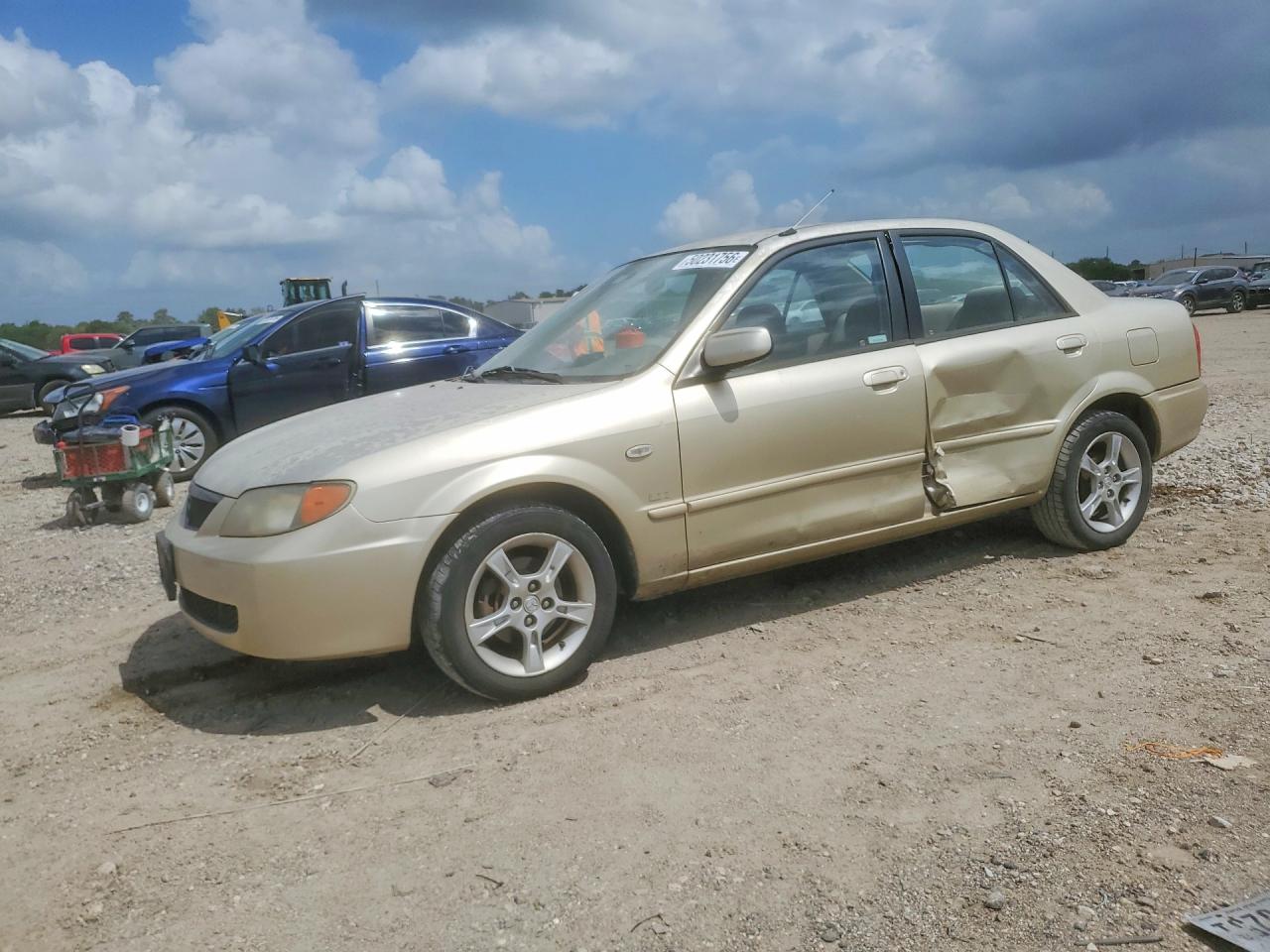 MAZDA PROTEGE 2003 — 2