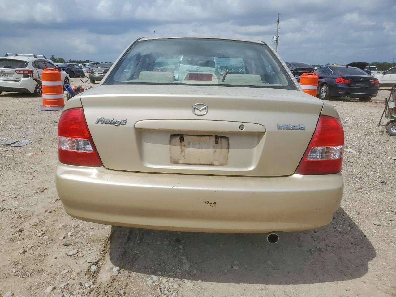 MAZDA PROTEGE 2003 — 7