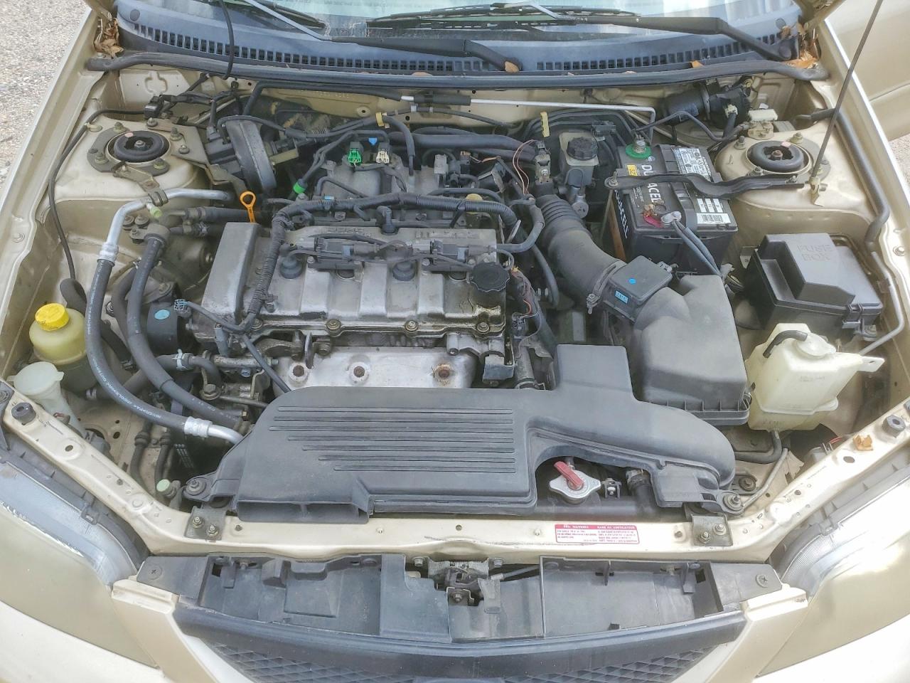 MAZDA PROTEGE 2003 — 12
