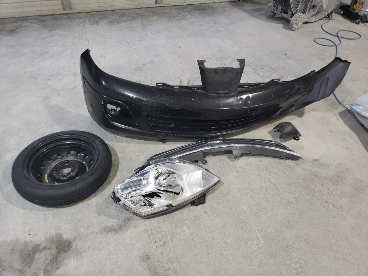 NISSAN VERSA 2010 — 14