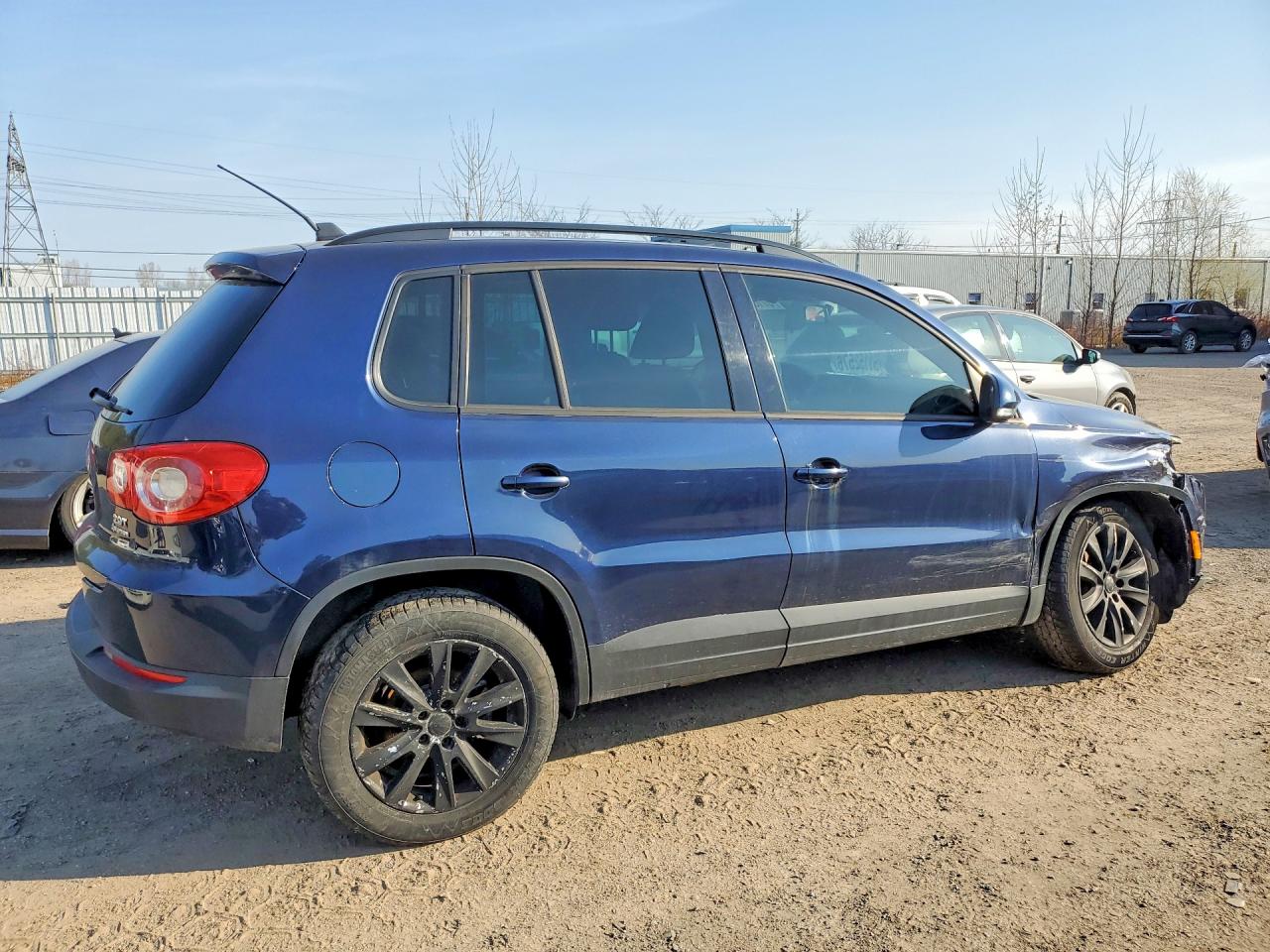 VOLKSWAGEN TIGUAN 2011 — 4