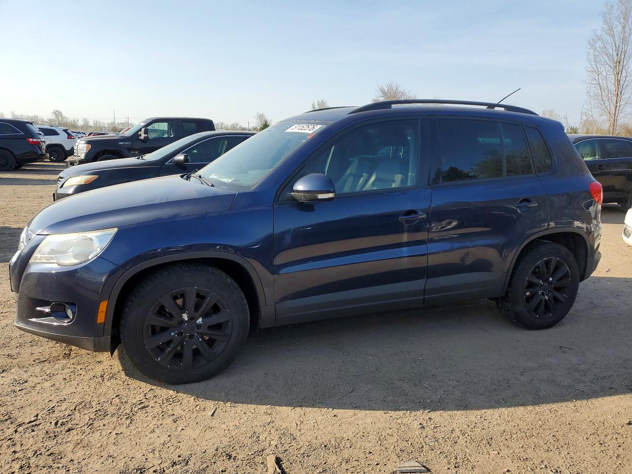 VOLKSWAGEN TIGUAN 2011 — 2