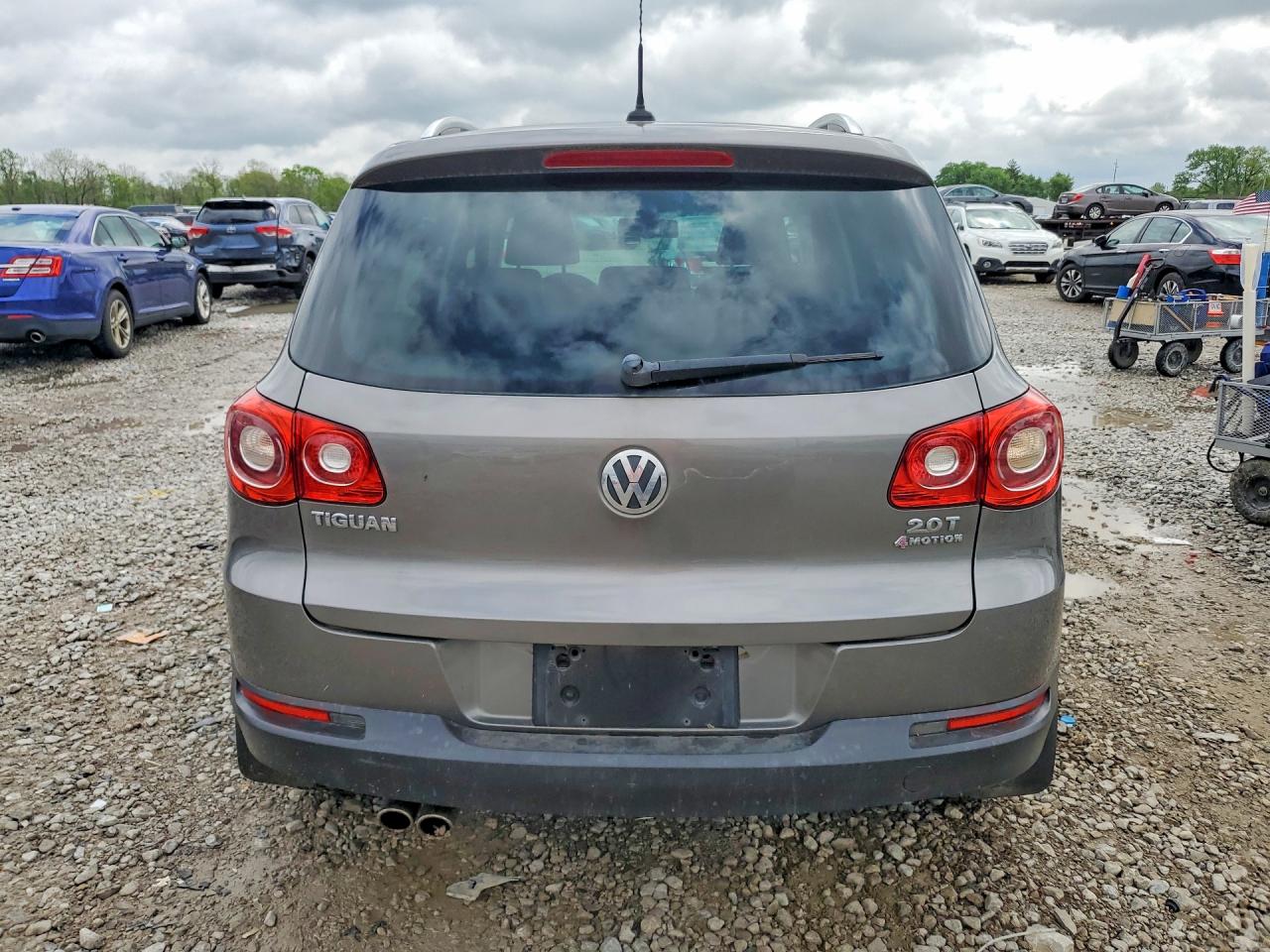 VOLKSWAGEN TIGUAN 2010 — 7