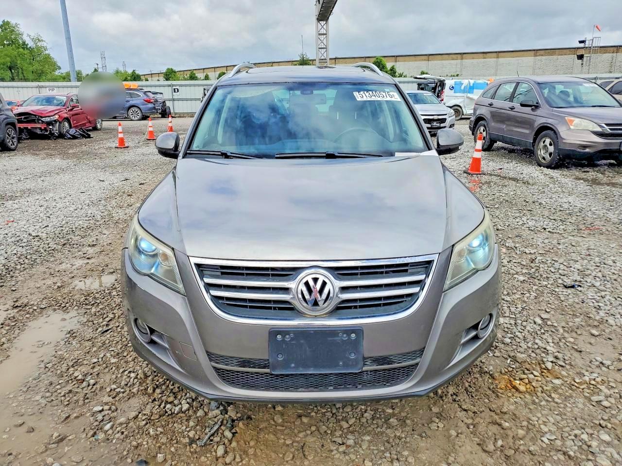 VOLKSWAGEN TIGUAN 2010 — 6