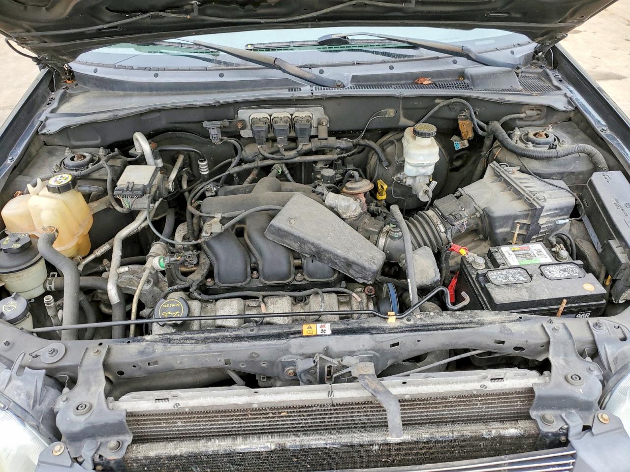 FORD ESCAPE 2005 — 13