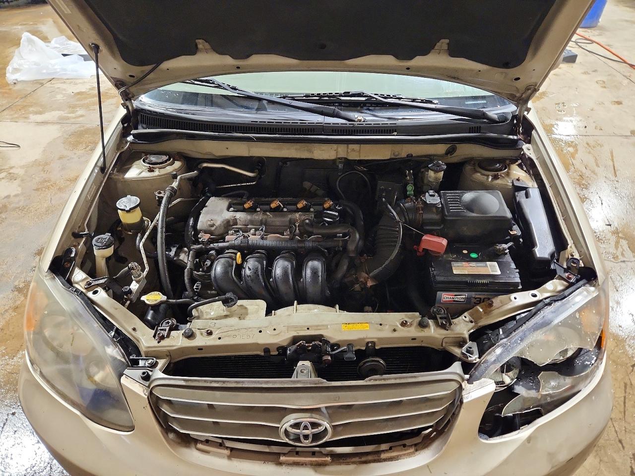TOYOTA COROLLA 2004 — 12