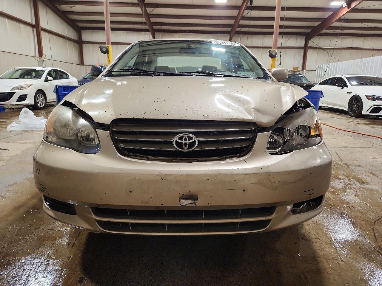 TOYOTA COROLLA 2004 — 6