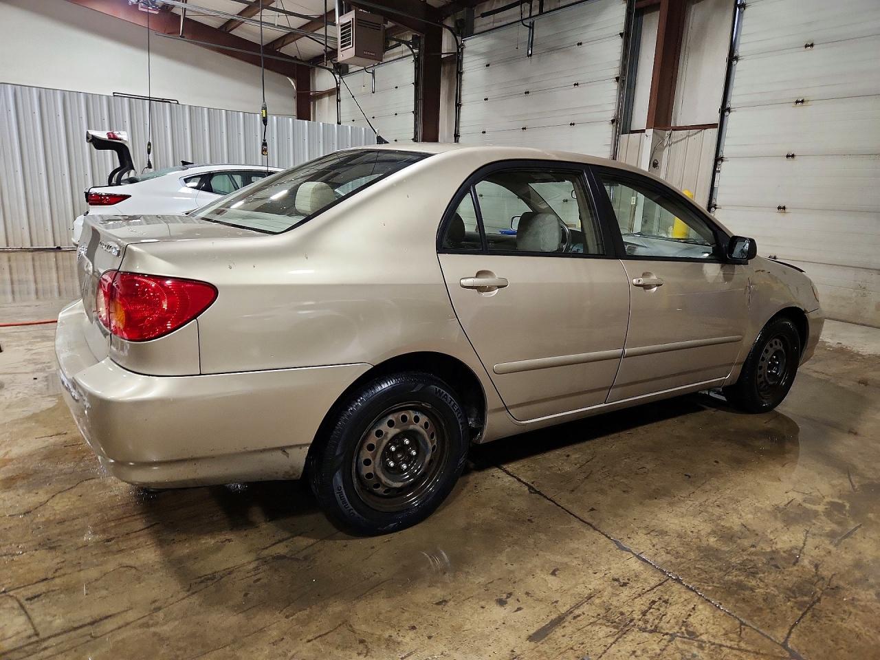 TOYOTA COROLLA 2004 — 4