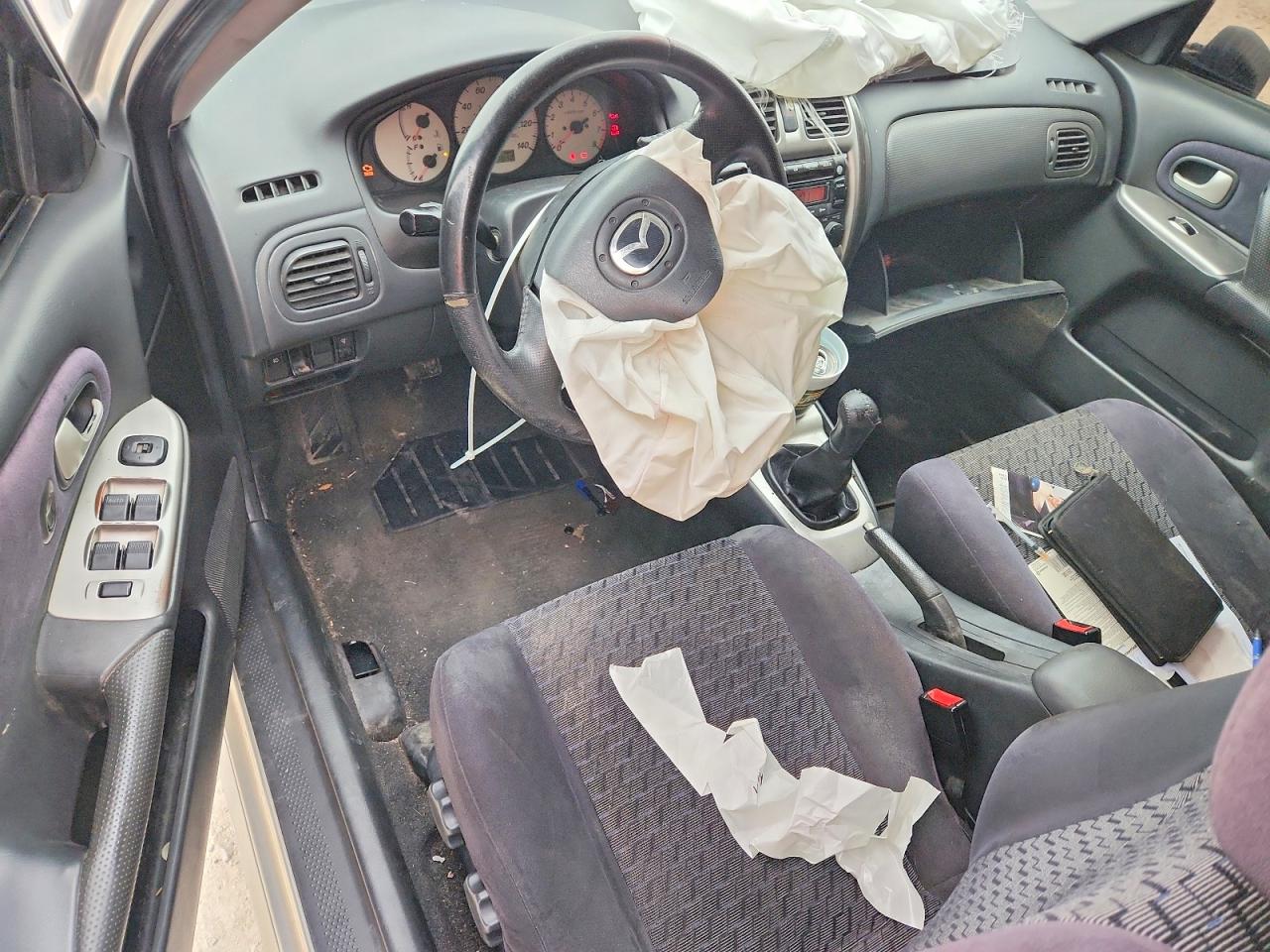 MAZDA PROTEGE 2003 — 9
