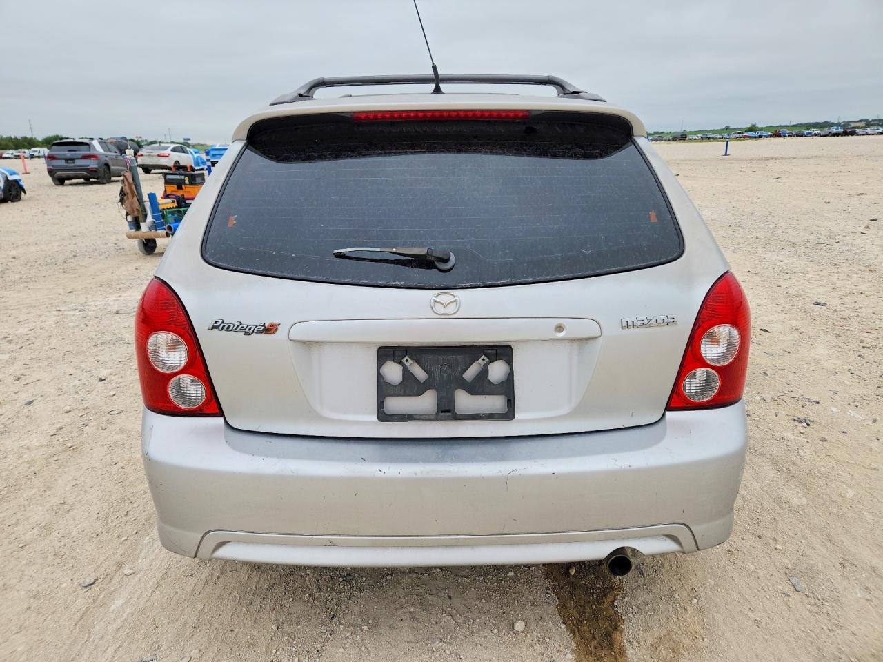 MAZDA PROTEGE 2003 — 7