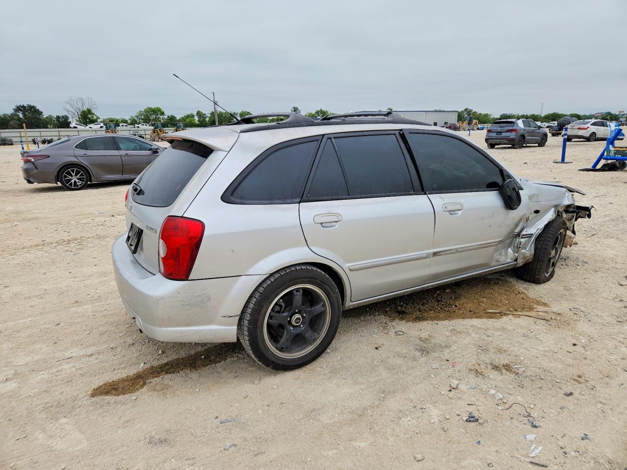 MAZDA PROTEGE 2003 — 4