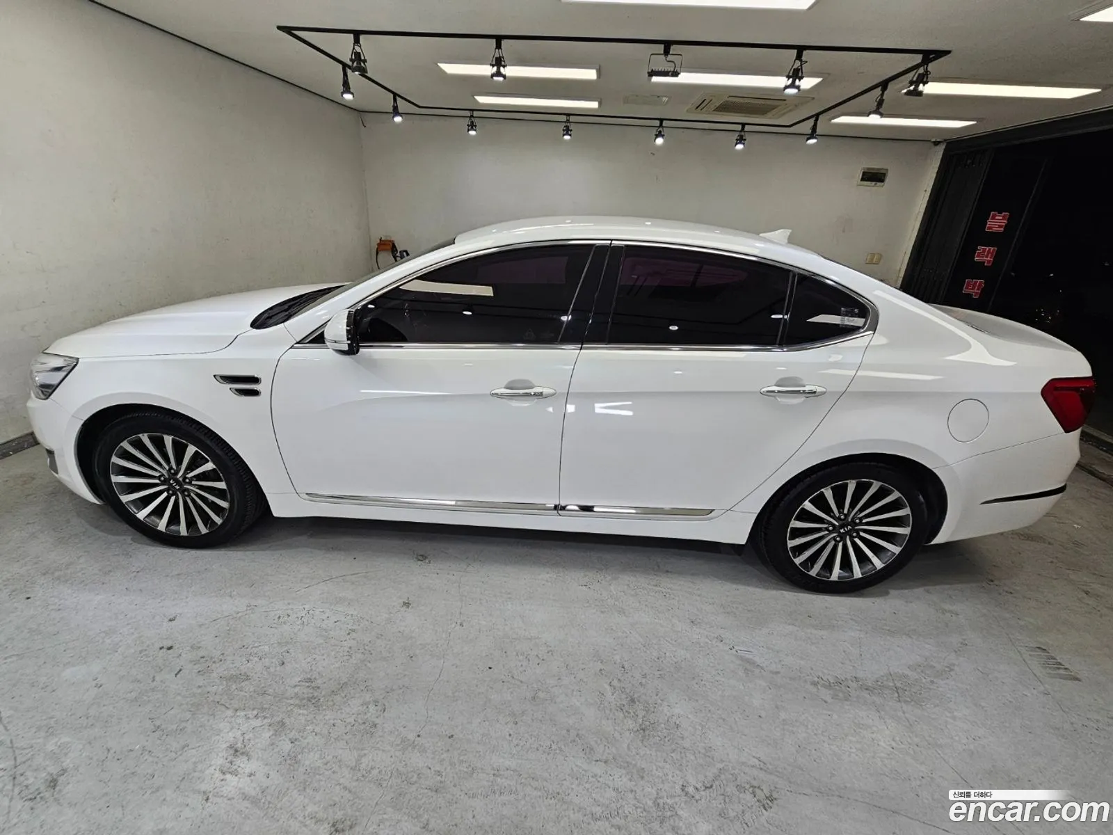 Kia K7 2012 — 7