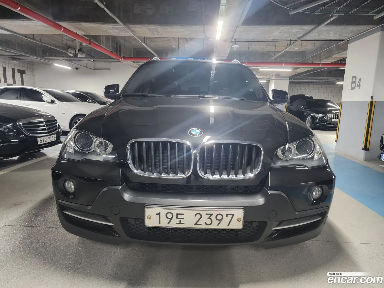 BMW X5 2010 — 19