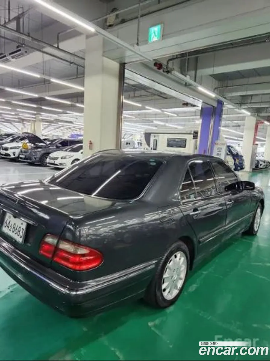 Mercedes-Benz E-Class W210 2001 — 13