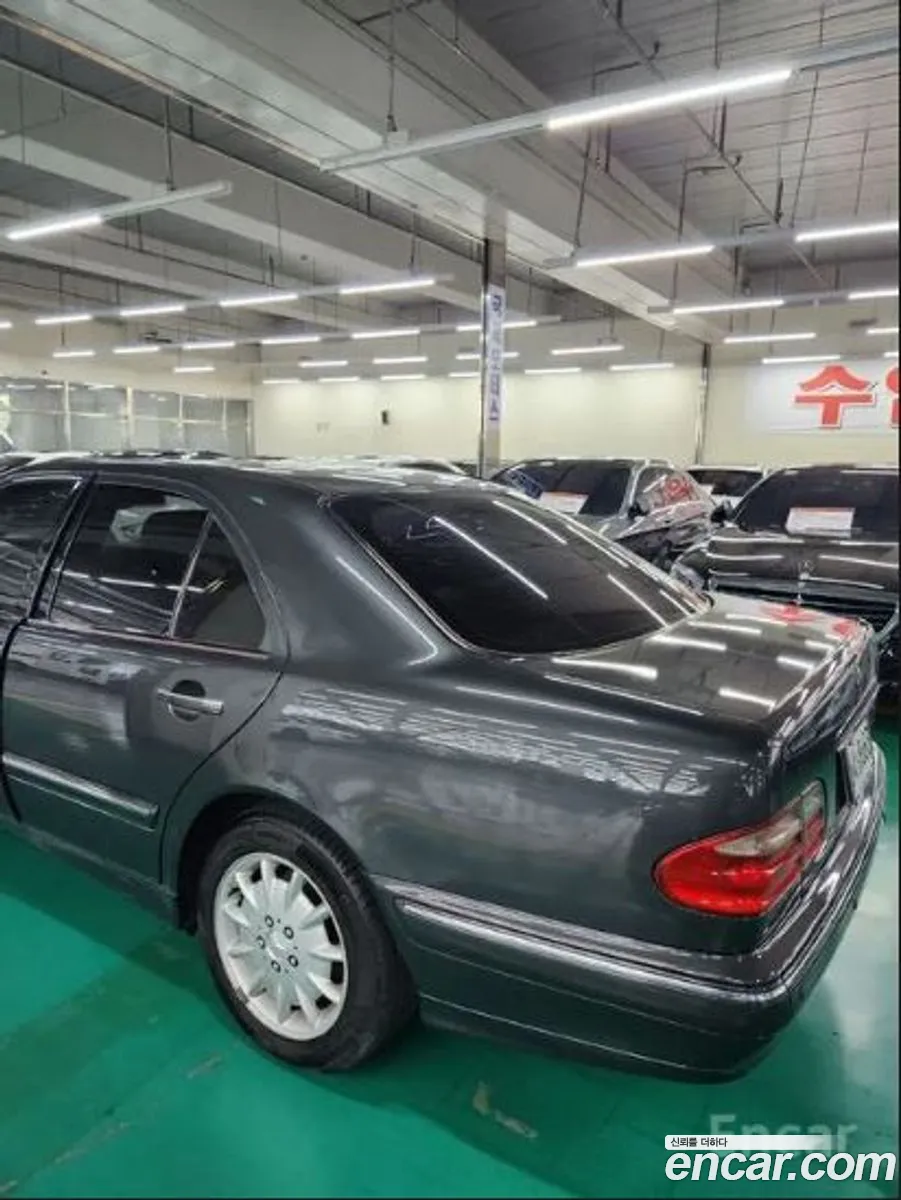 Mercedes-Benz E-Class W210 2001 — 14