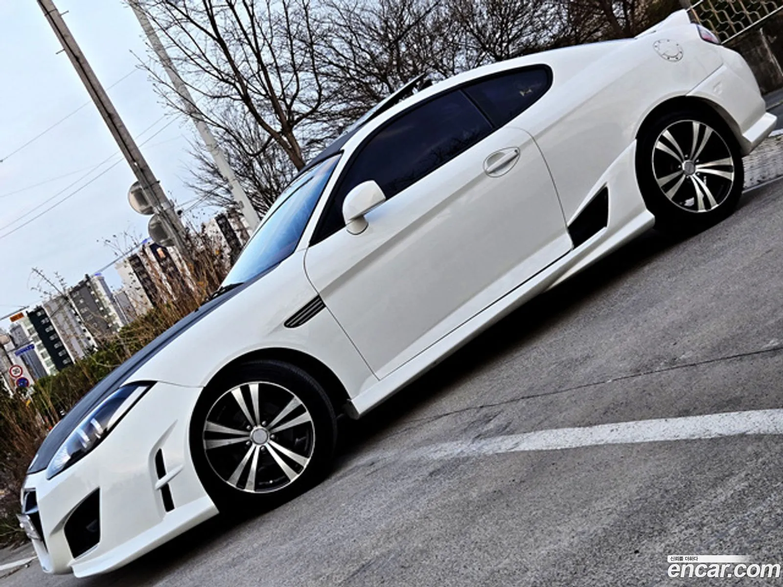 Hyundai Tuscani 2007 — 19
