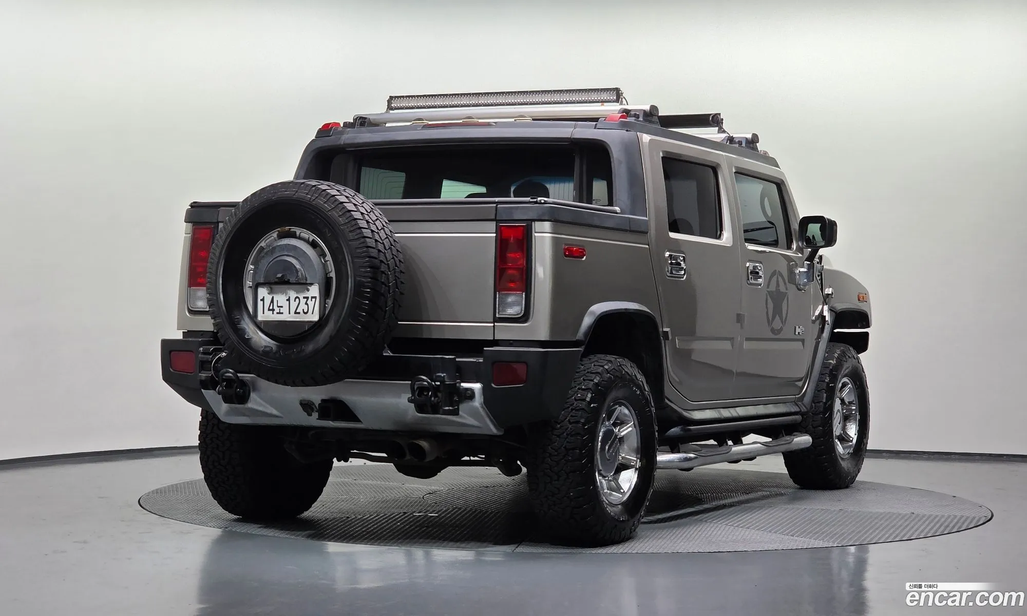 Hummer H2 2005 5GRGN22U75H105007 — 17