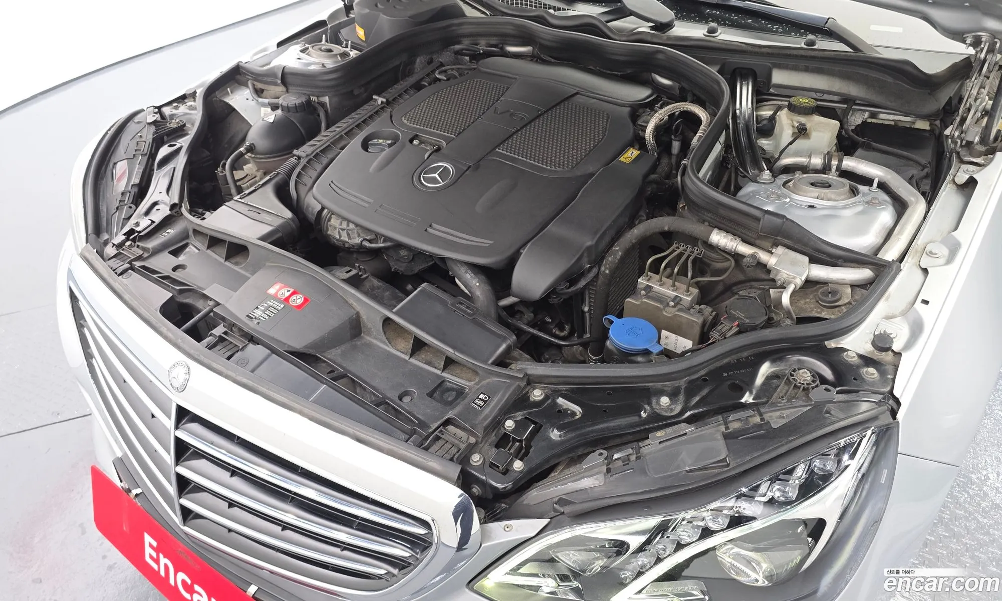 Mercedes-Benz E-Class W212 2014 WDDHF5FB9EB024631 — 2
