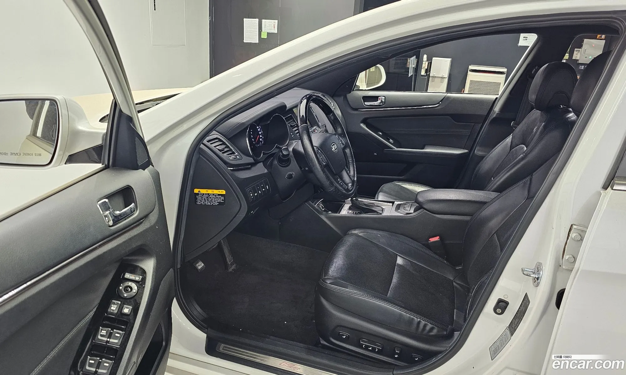 Kia K7 2010 — 7