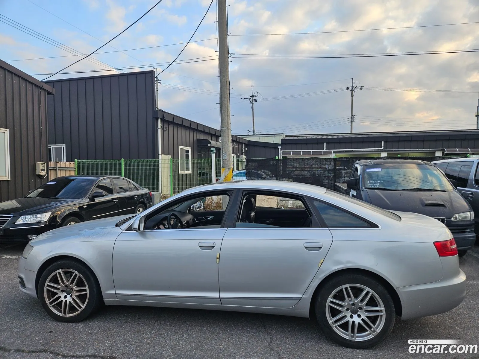 Audi A6 2009 — 4