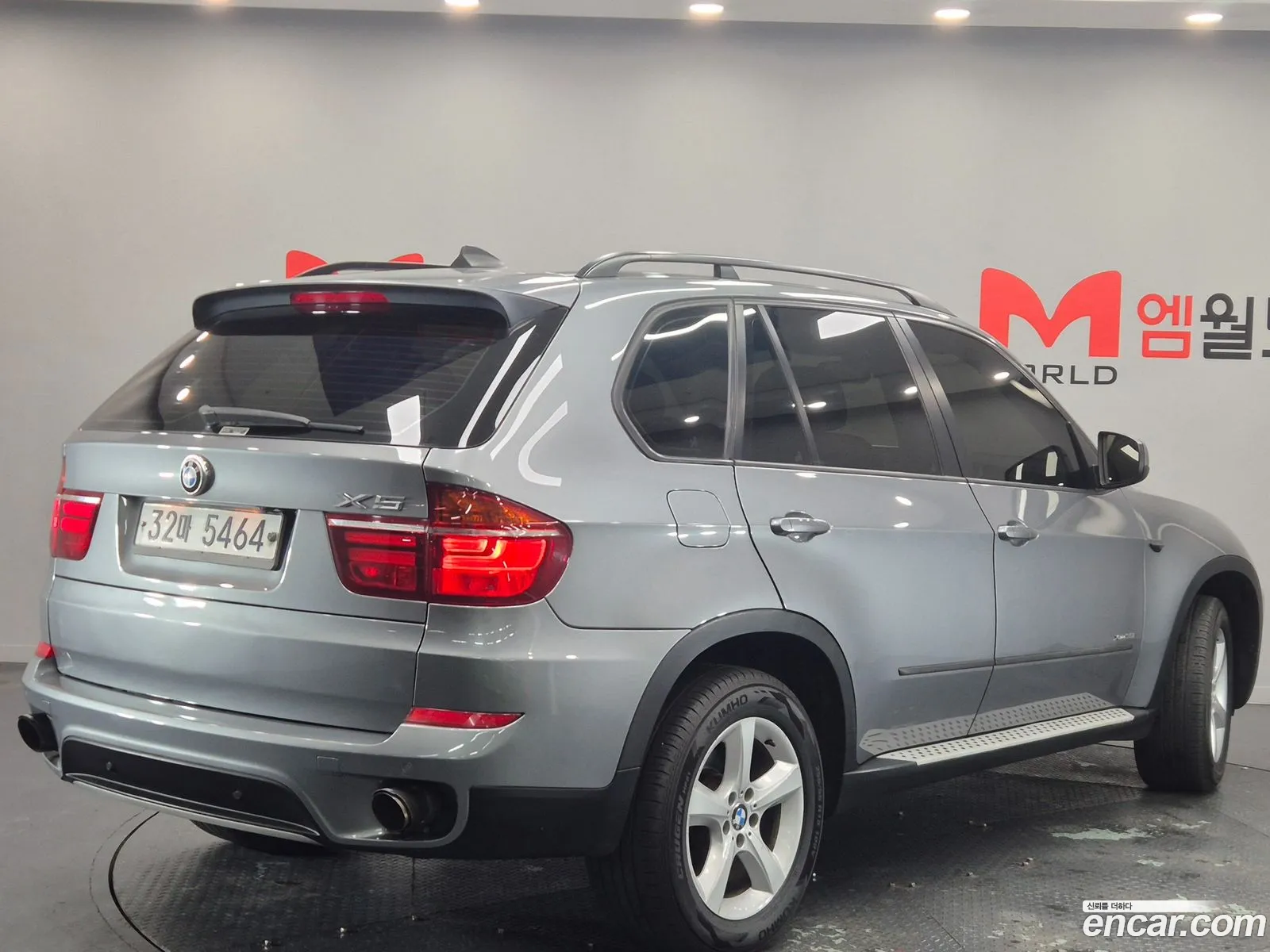 BMW X5 2010 — 6