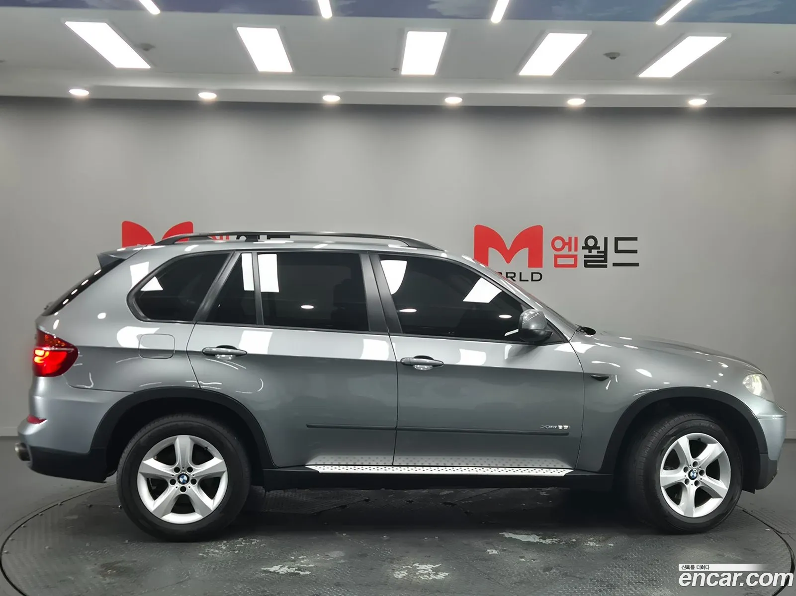 BMW X5 2010 — 7