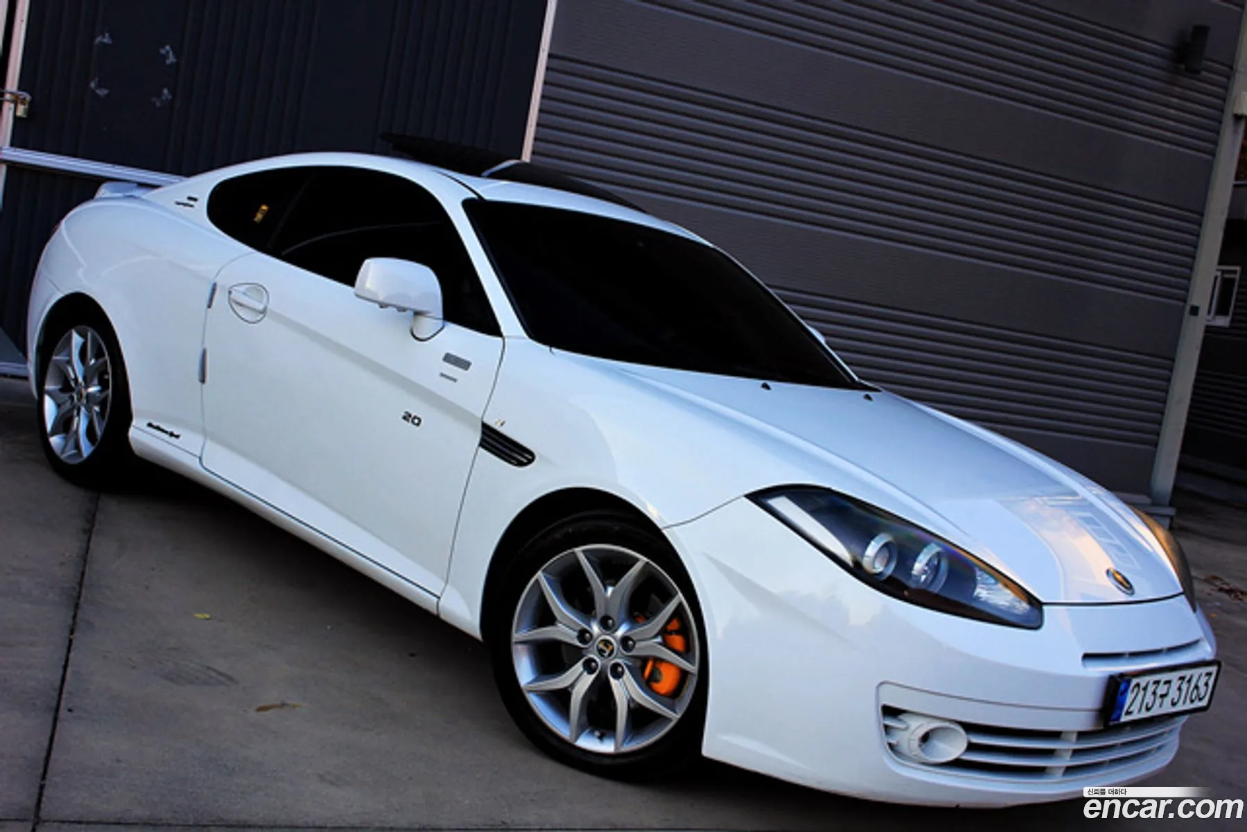 Hyundai Tuscani 2008 — 12