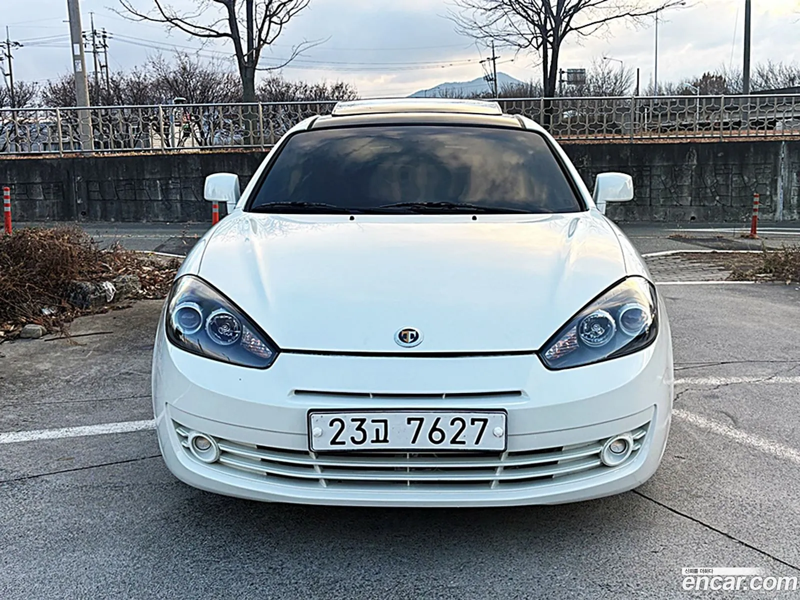 Hyundai Tuscani 2007 — 13