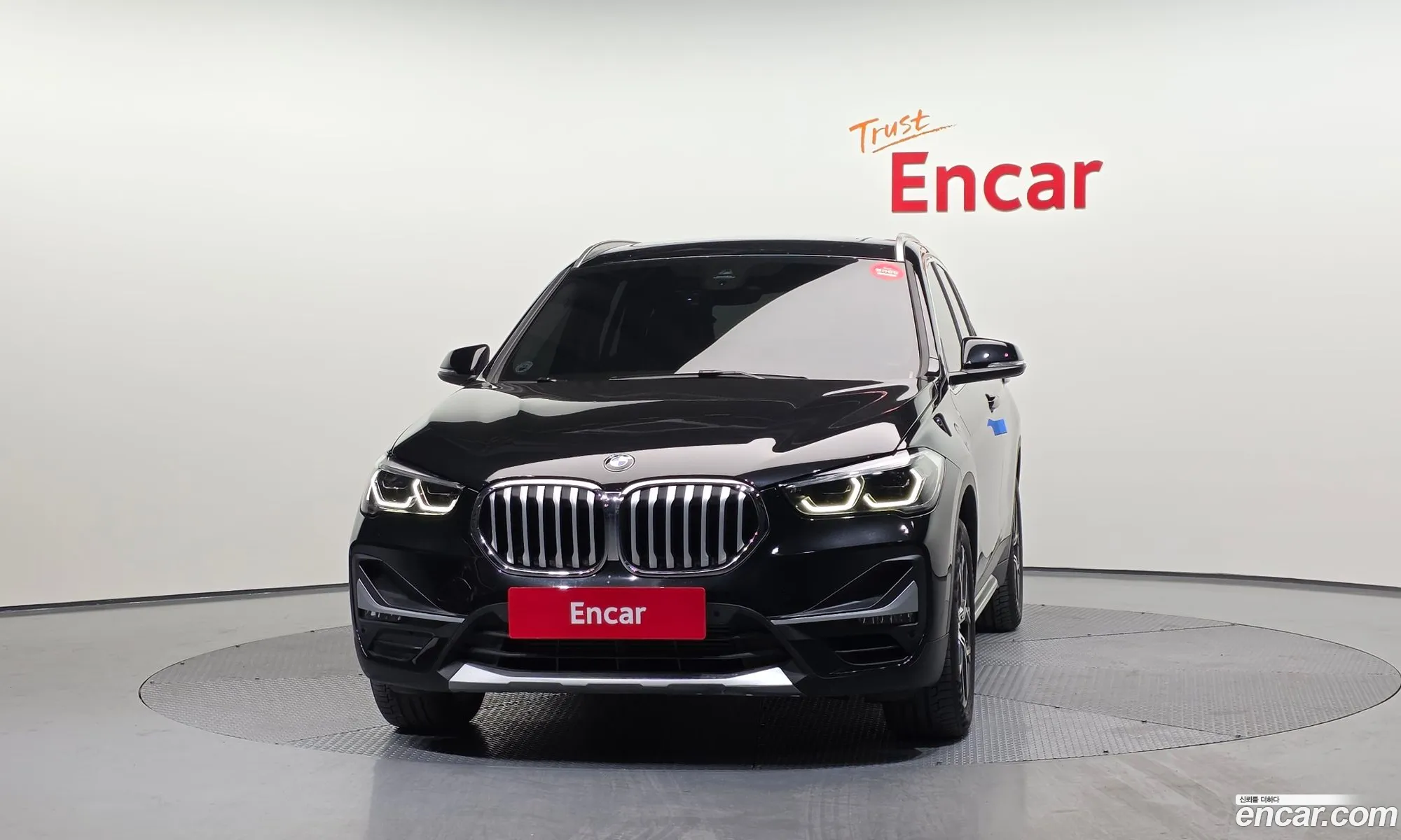 BMW X1 2021 WBA11DG01M5T35305 — 4