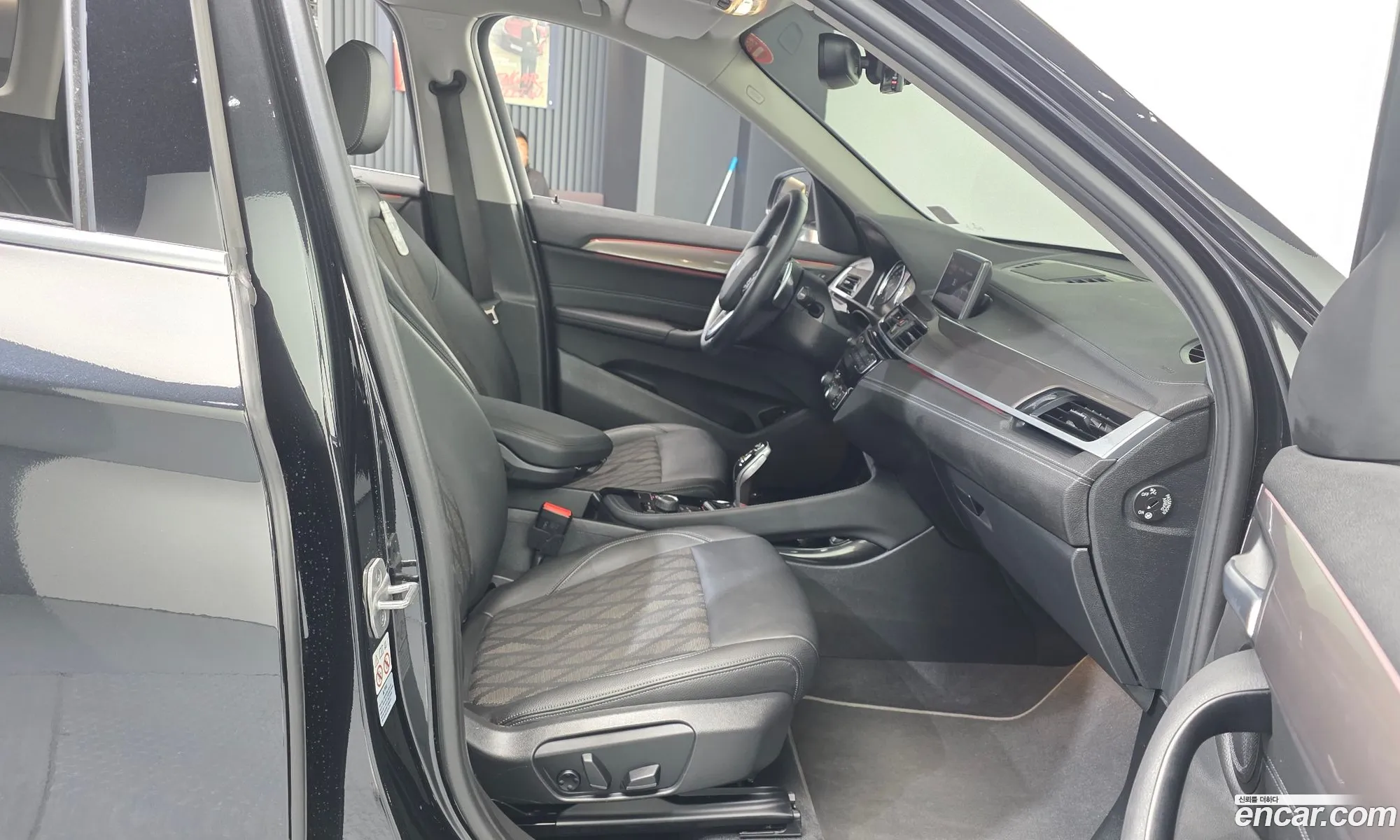 BMW X1 2021 WBA11DG01M5T35305 — 3