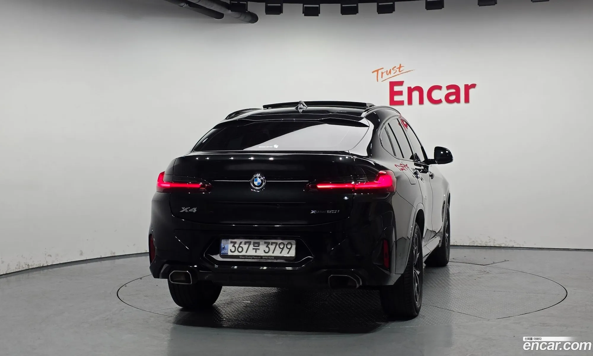 BMW X4 2021 WBA21DT00N9J57214 — 2