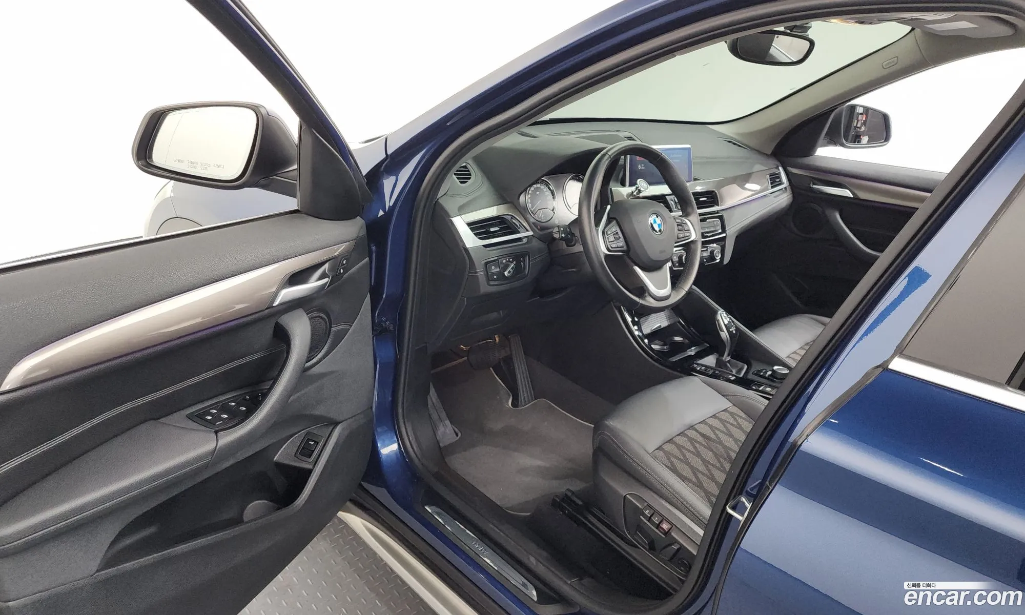 BMW X1 2021 WBA11DG09M5S82630 — 9