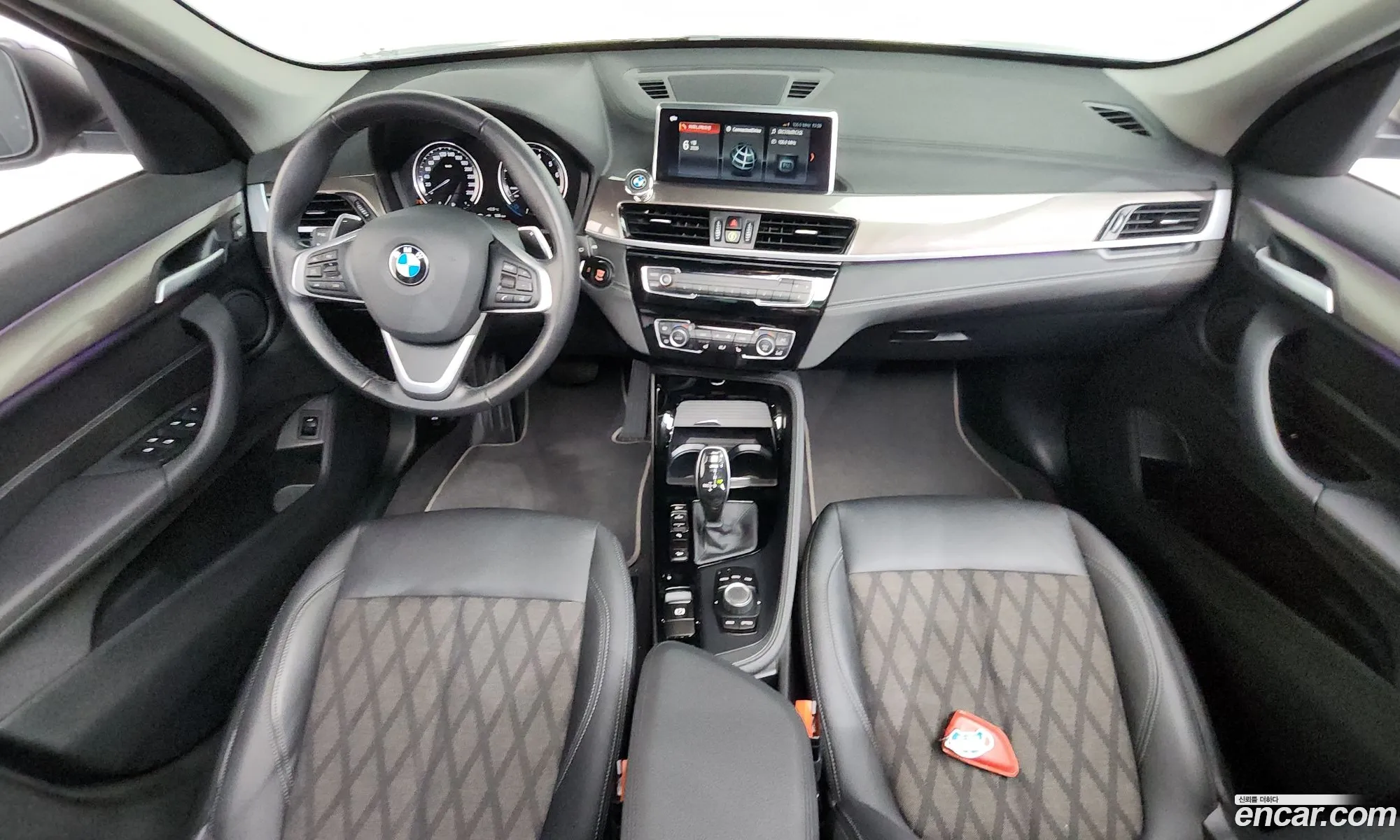 BMW X1 2021 WBA11DG09M5S82630 — 24