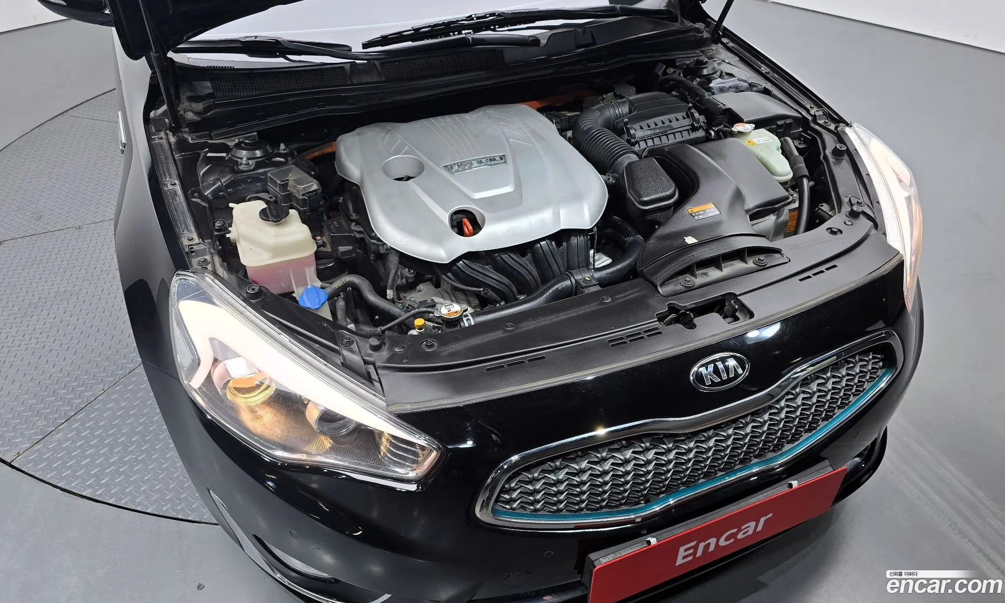 Kia K7 Hybrid 2014 — 7