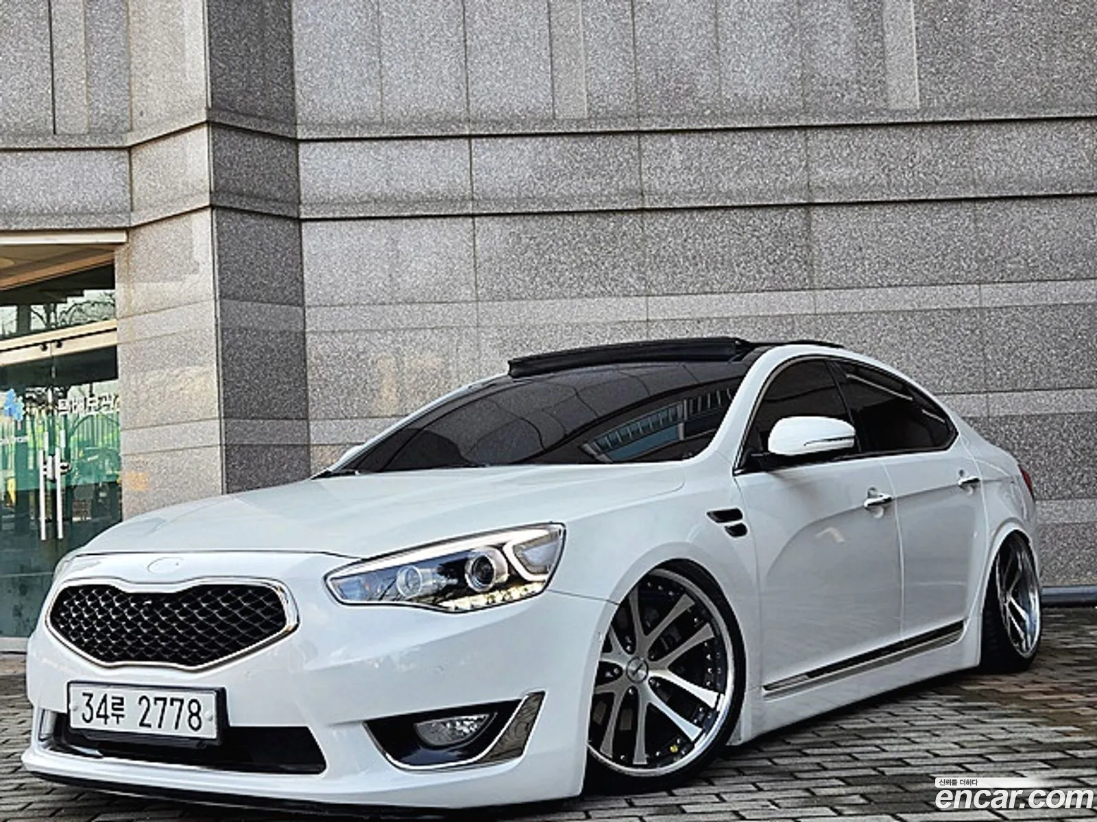 Kia K7 2013 — 7