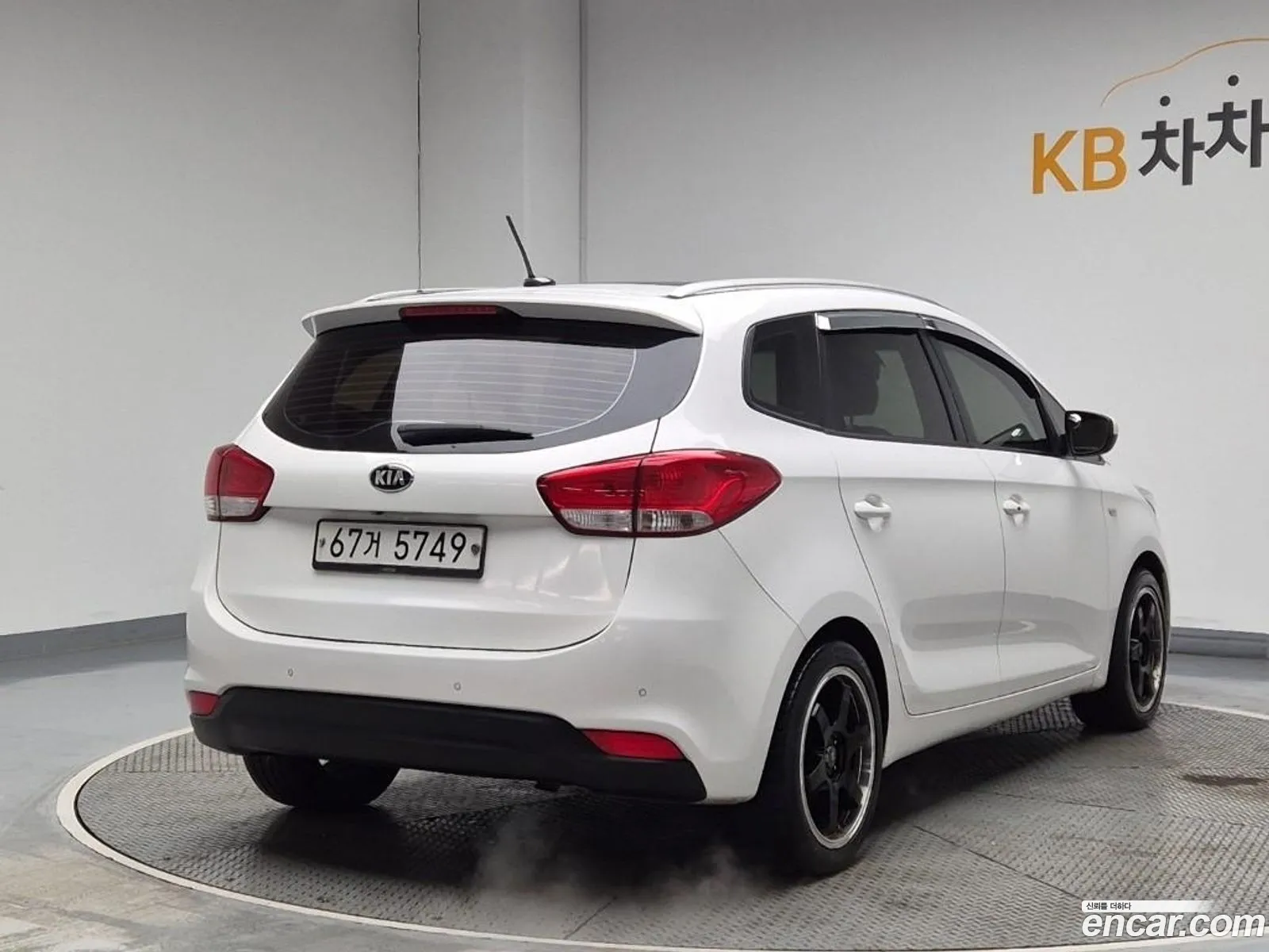 Kia Carens 2014 — 11