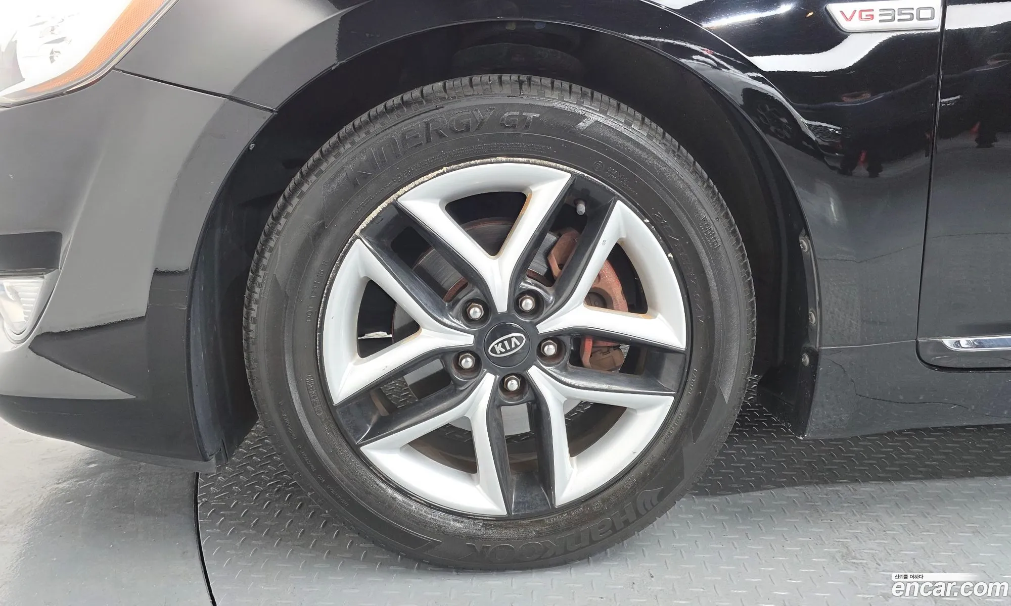 Kia K7 2011 — 14