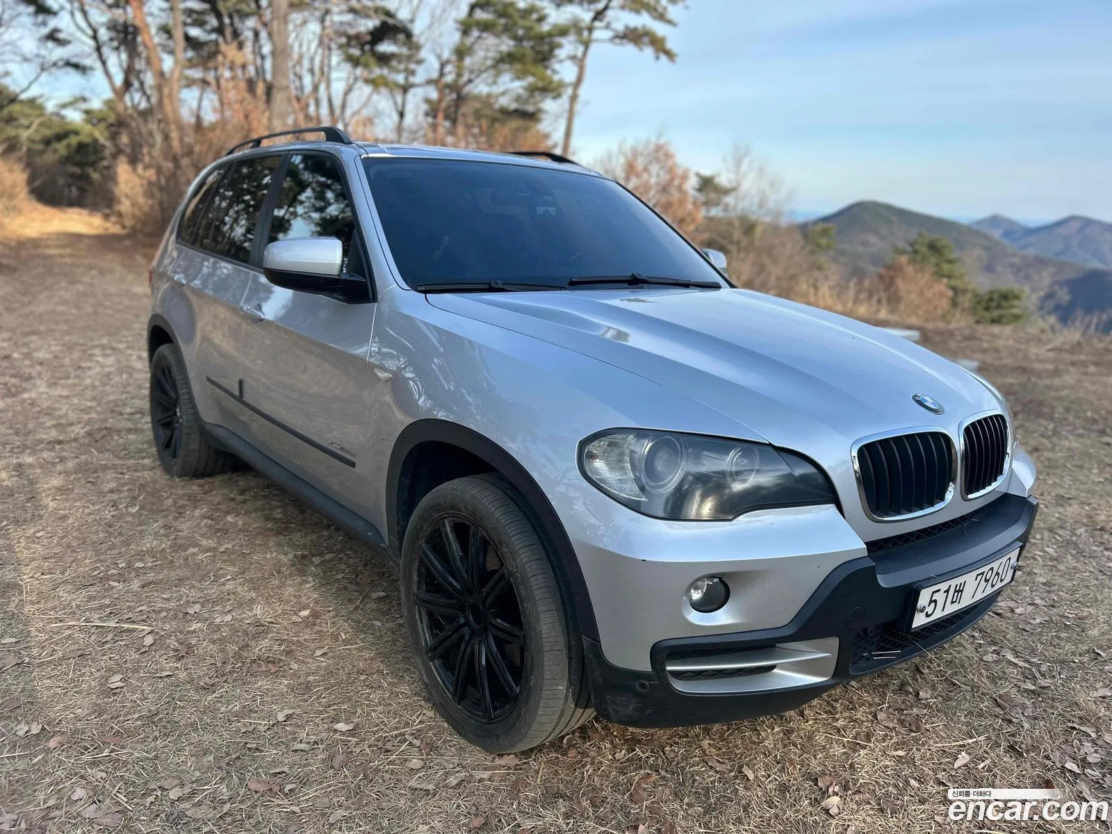 BMW X5 2009 — 7