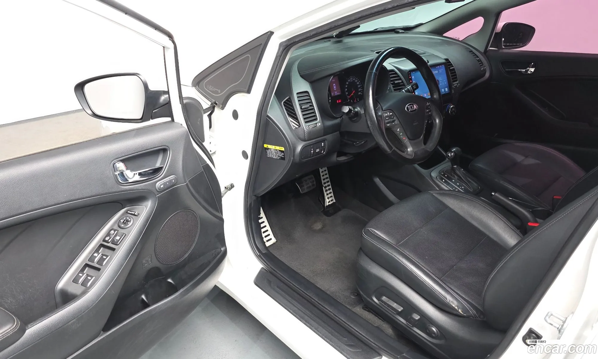 Kia K3 2012 — 2