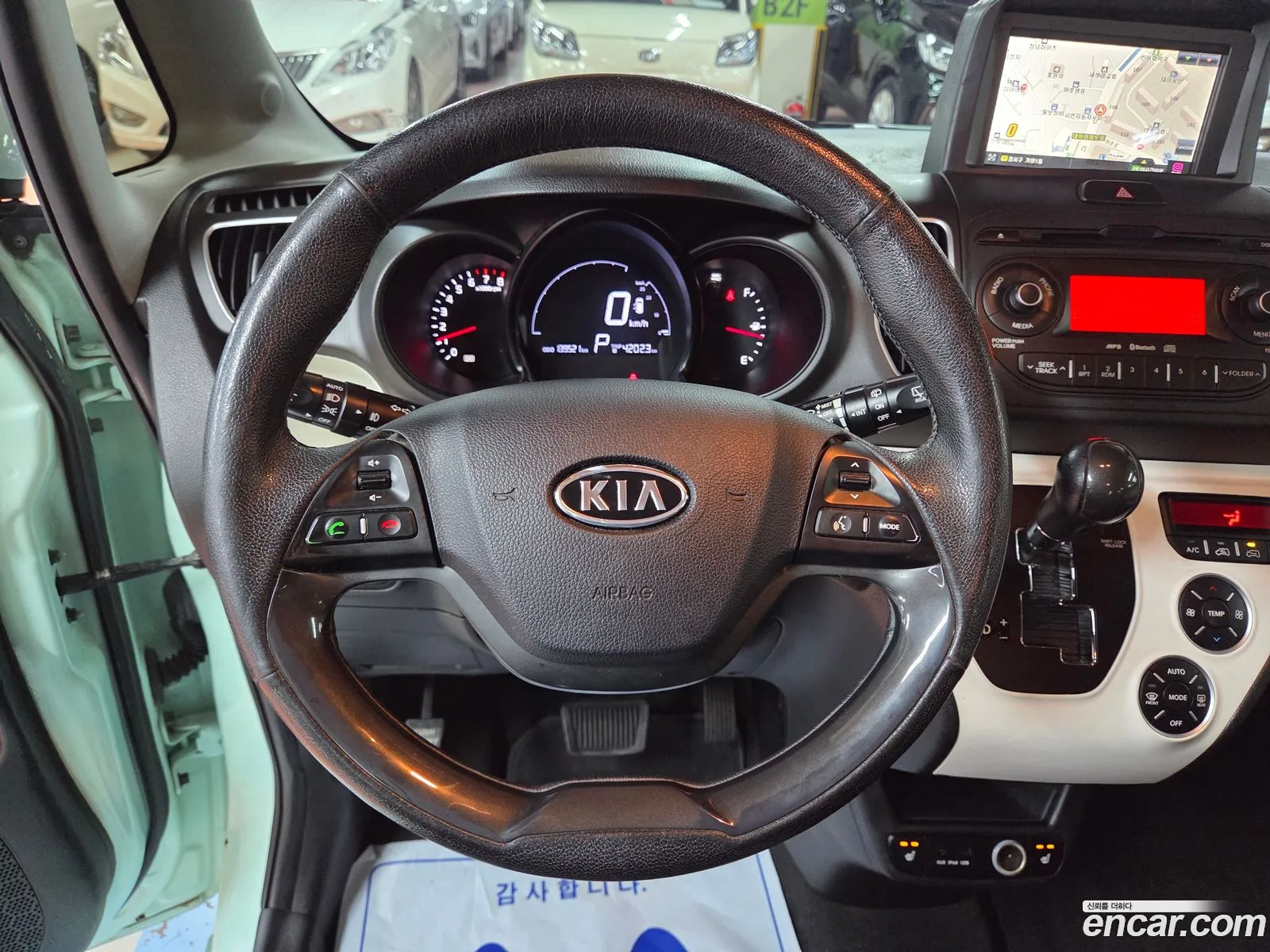 Kia Ray 2012 — 13