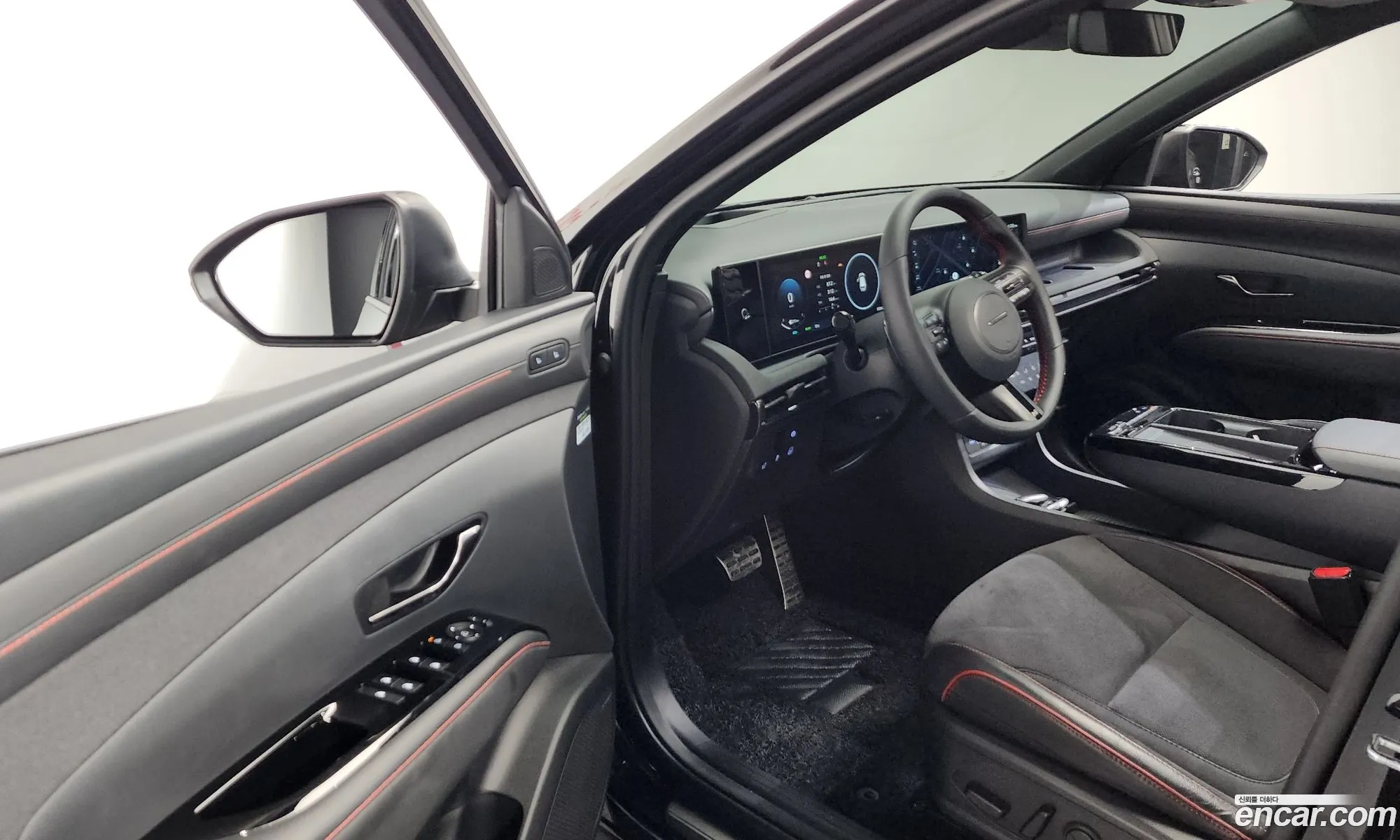 Hyundai Tucson Hybrid 2025 — 7