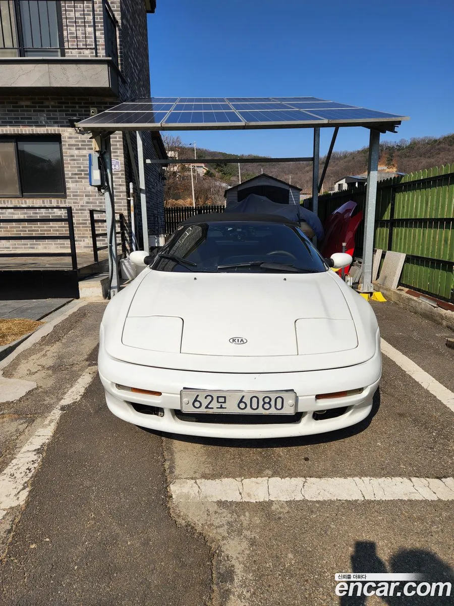 Kia Elan 1997 — 12