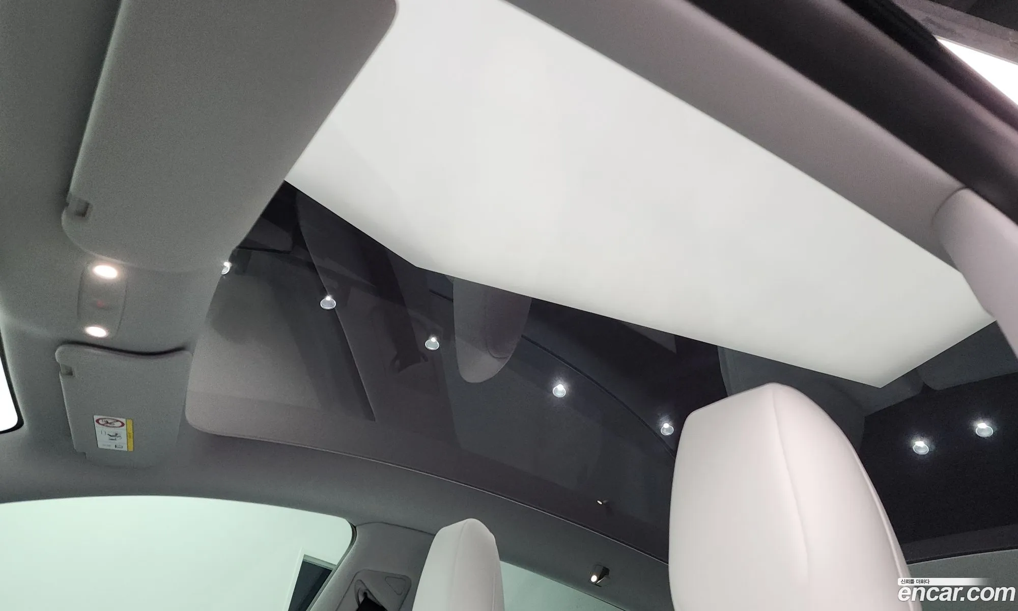 Tesla Model Y 2025 LRWYGCEK7SC077215 — 4