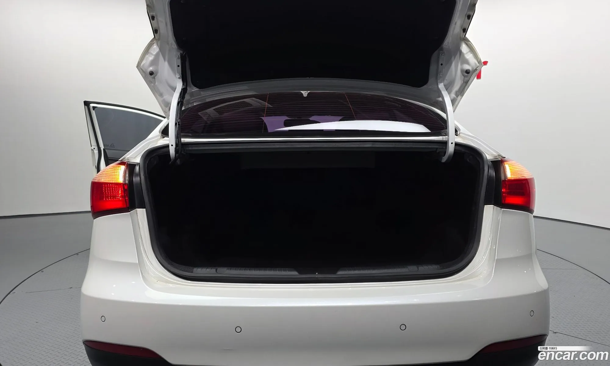 Kia K3 2013 — 3