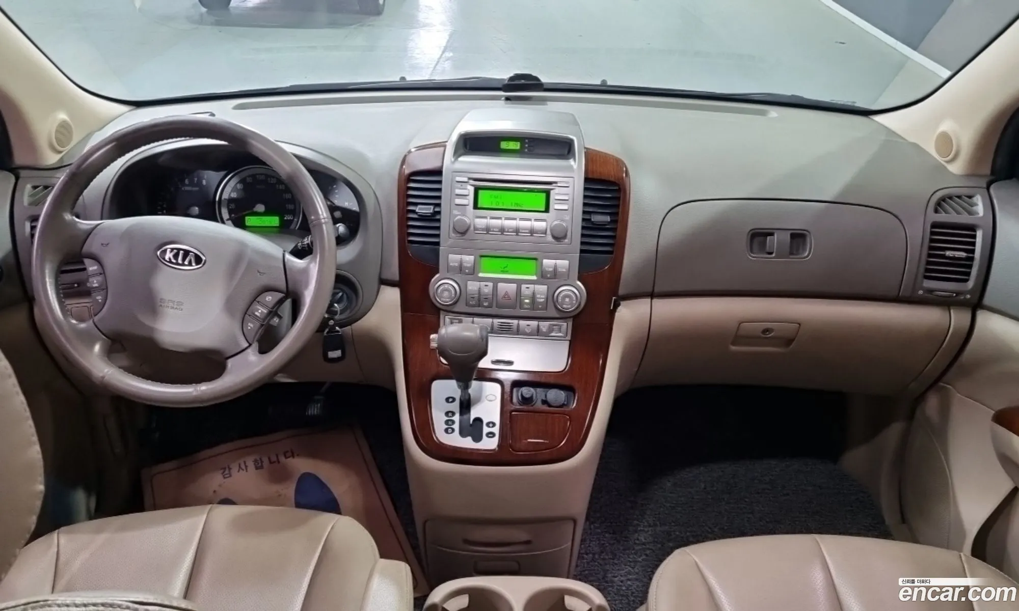Kia Grand Carnival 2007 — 13
