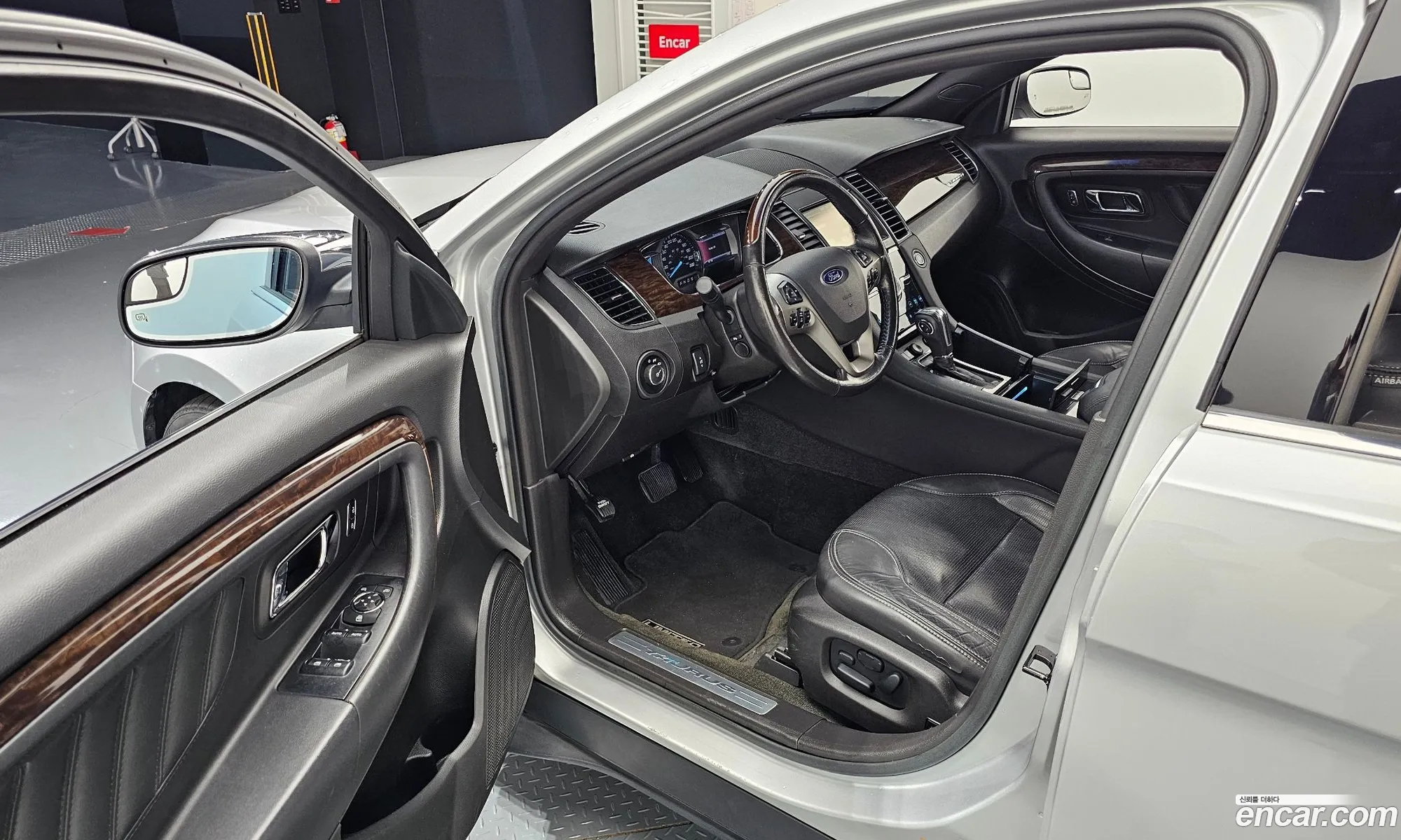 Ford Taurus 2014 1FAHP2F93EG142928 — 12